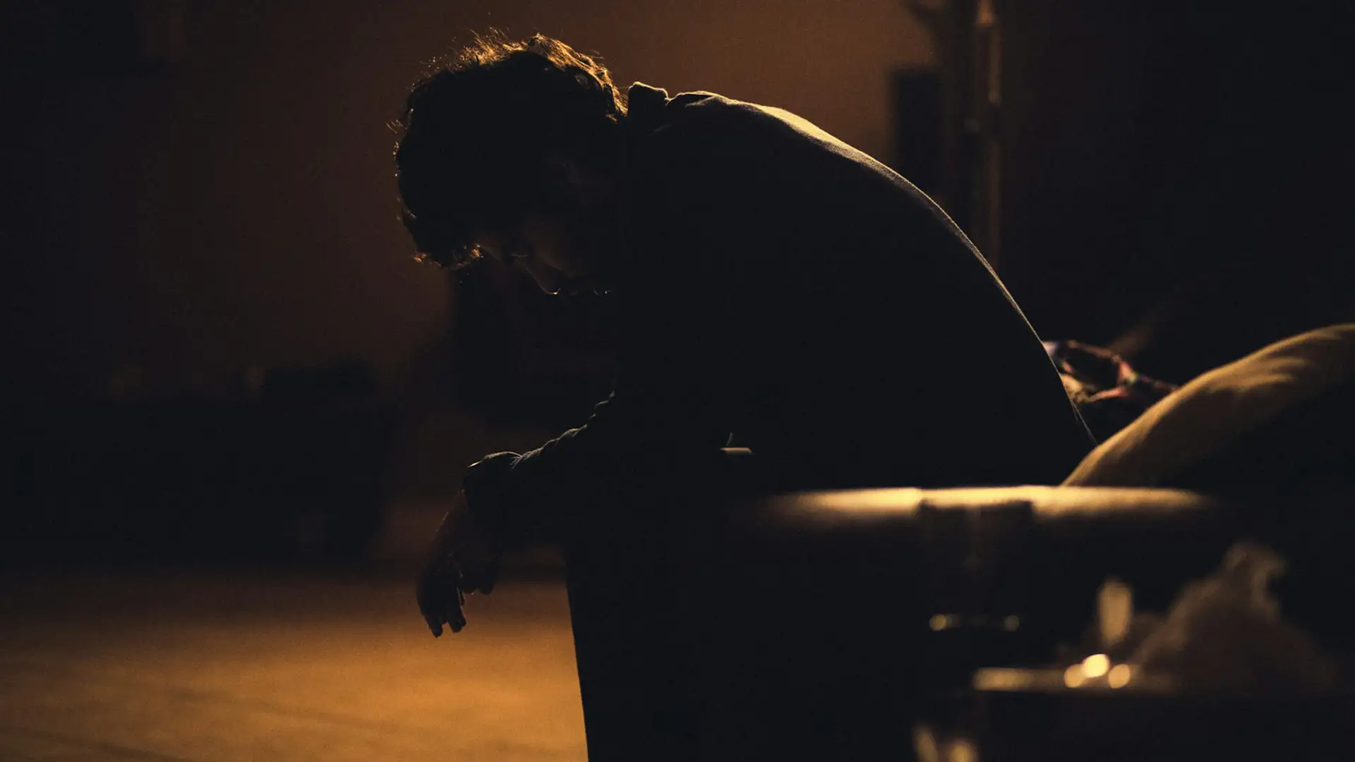 Person feeling numb and drained, exploring natural ways to manage depression.